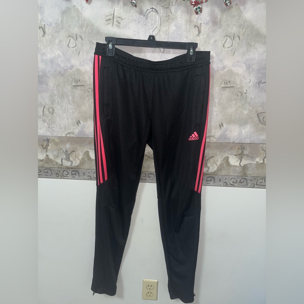 Women’s Adidas track pants with side zippers. Climacool effect. Rarely worn.